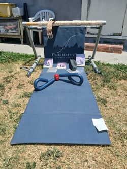 Fluidity fitness ballet Barre, thighmaster and weight training belt (small).