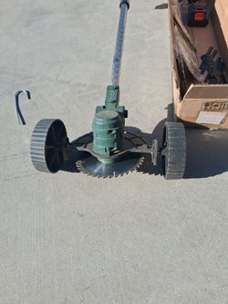 Battery powered trimmer/ edger/ lawn mower