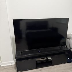 TV 65 Pulgadas Smart TLC Con su Centro De Entretenimiento Con luces Led Sin Detalles 