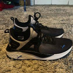 These Are Puma Shoes And Their Blue And Black