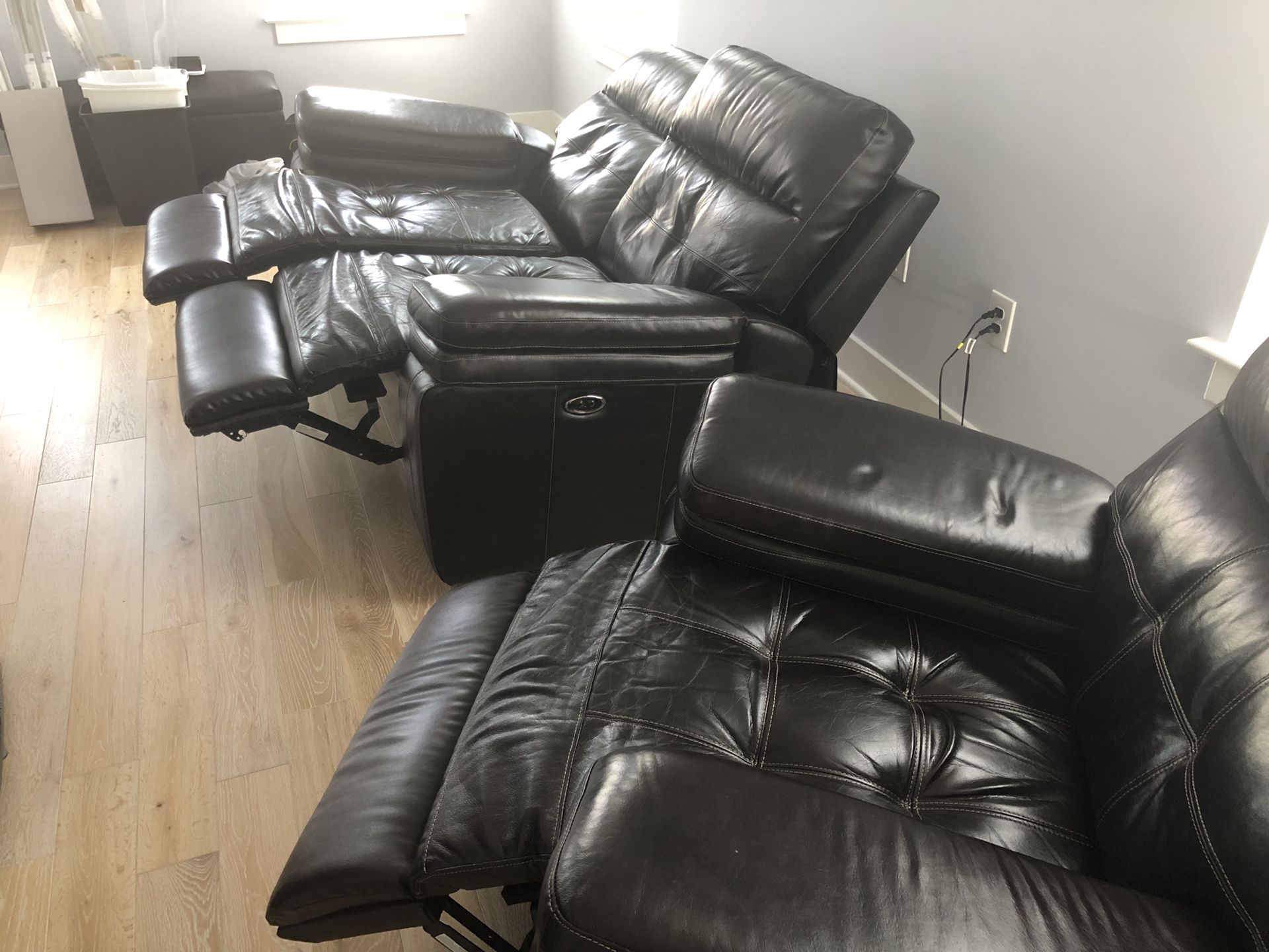 Dark brown leather electric reclining loveseat AND recliner
