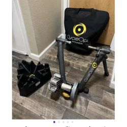 Excellent Condition Fluid Bike Trainer with everything pictured.  $40