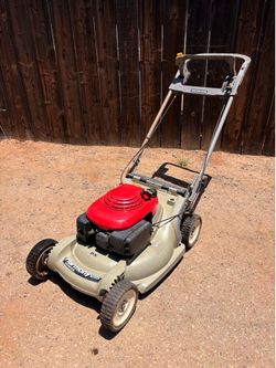 Honda 215 harmony lawnmower with blade control