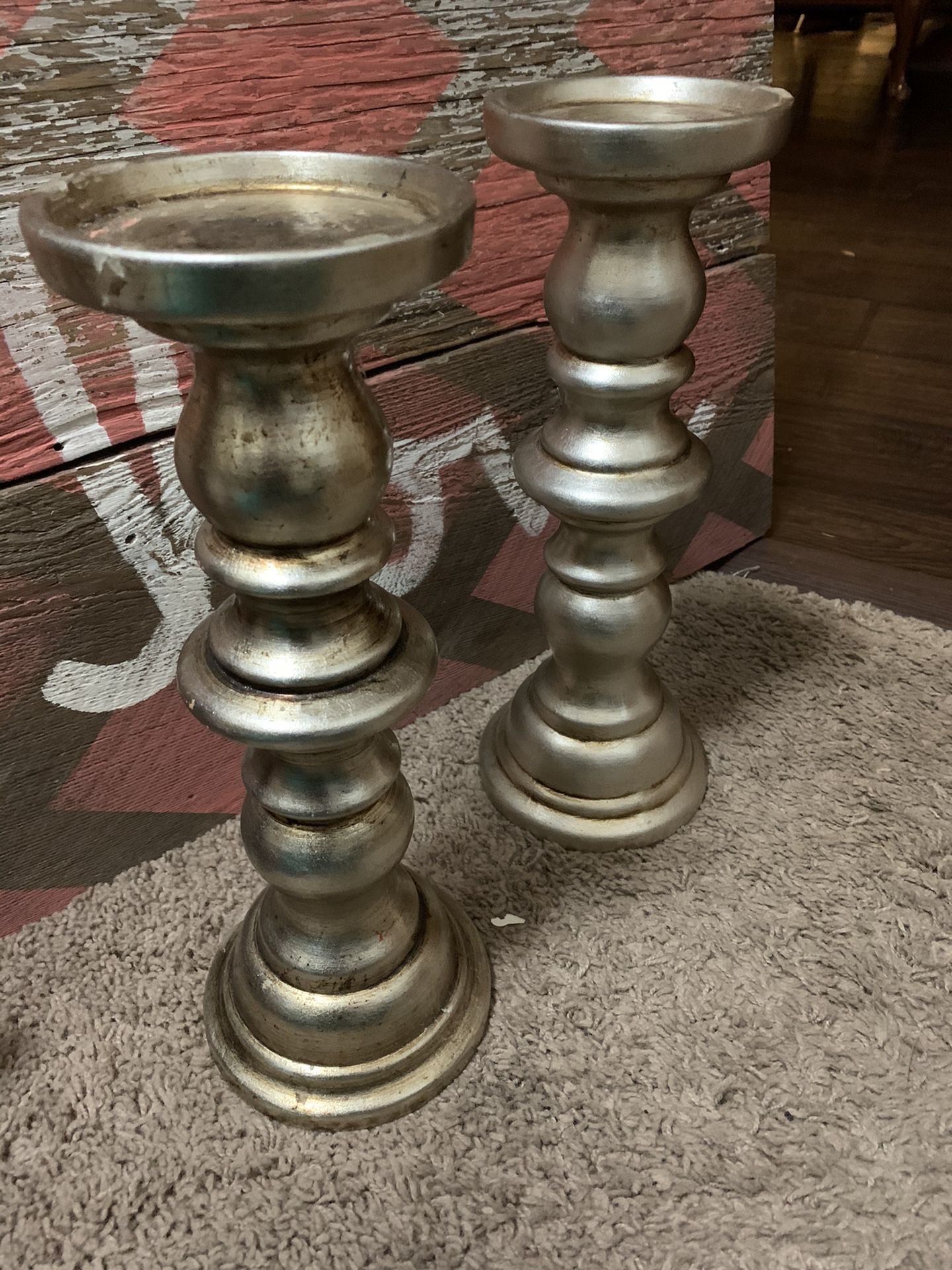 Pair of silver pillar candle holders centerpiece