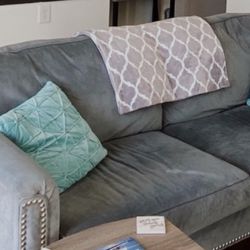 Light Blue/Grey Couch w/Bronze Studs Design