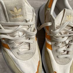cream & orange adidas size 10