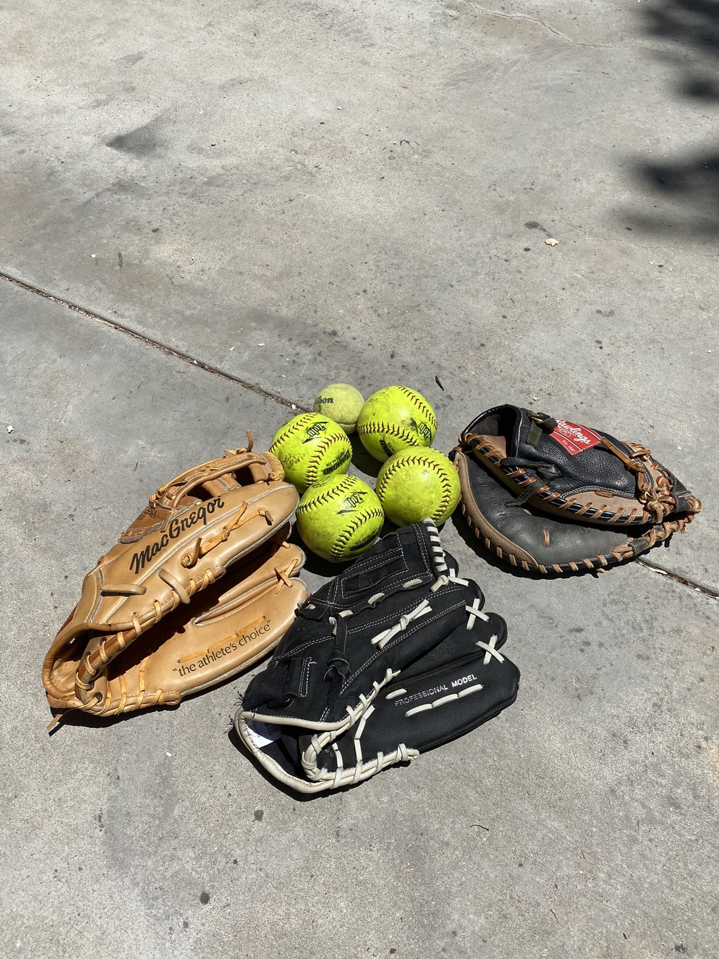 Baseball gloves and softballs