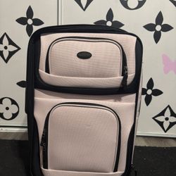 medium pink suitcase and duffle 