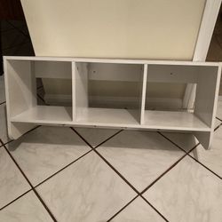 Shelf with hooks