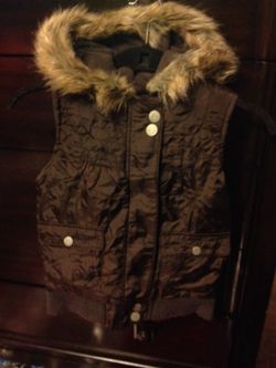Brown vest w/ fur on hat