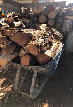 Loaded wheelbarrow firewood