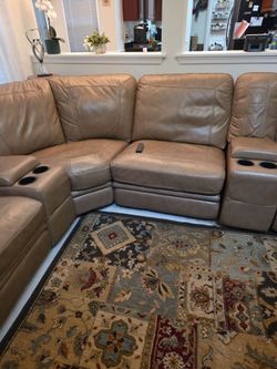 Leather reclining sofa and lounge chair