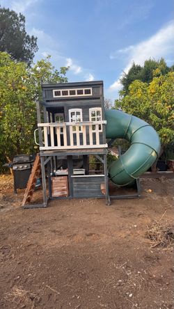 KidCraft two-story playhouse with slide