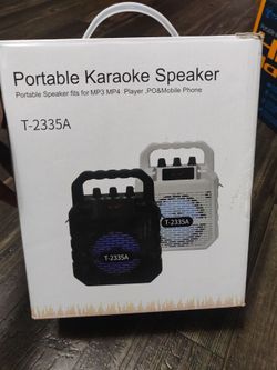 Portable Bluetooth speaker with karaoke Mic for kids