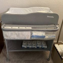 Sweeby portable baby changing table on wheels