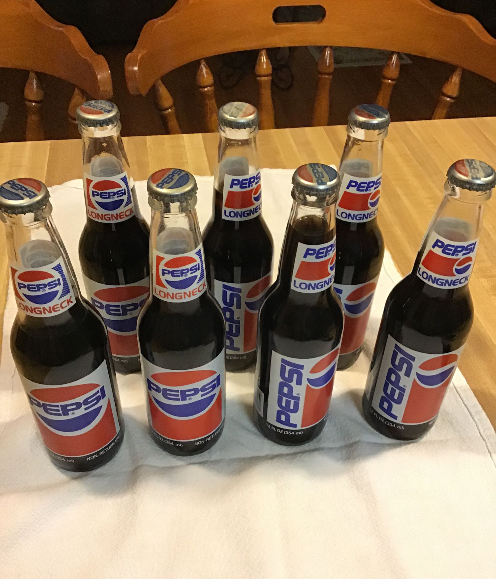 Seven long neck Richard Petty Pepsi bottles