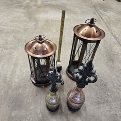 Four home decoration pieces/ candle holders