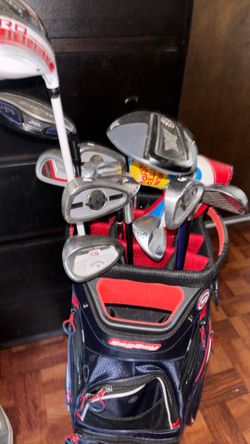 Bag boy with clubs