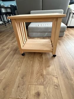 Wood wheel end table