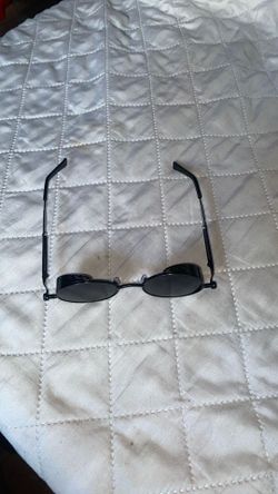 steampunk-style sunglasses with side shields.  