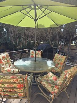 Patio furniture set with brand new cushions umbrella