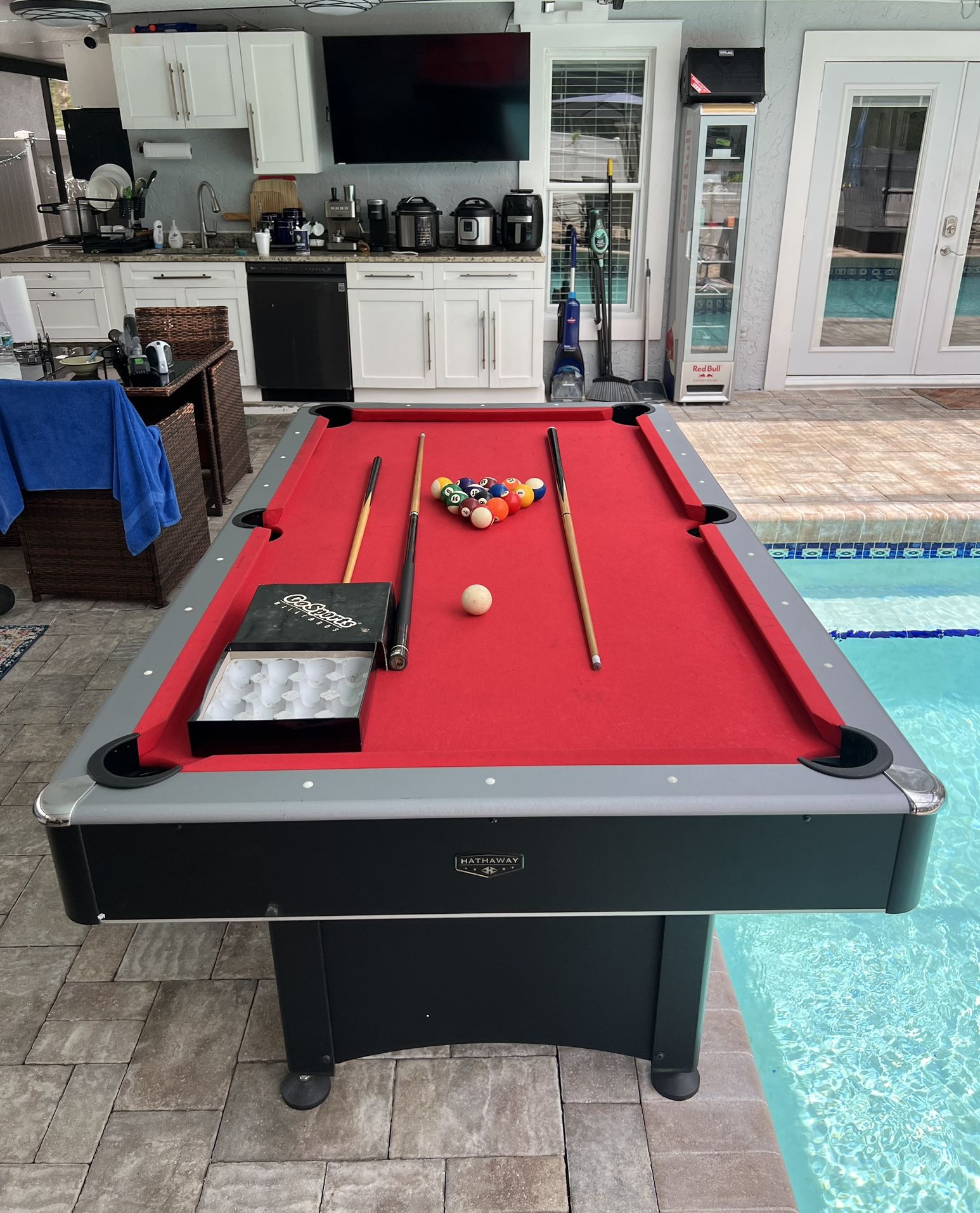 Pool table.This perfect pool table comes with 16 billiard balls and 3 wooden dowels.I can deliver for an additional cost