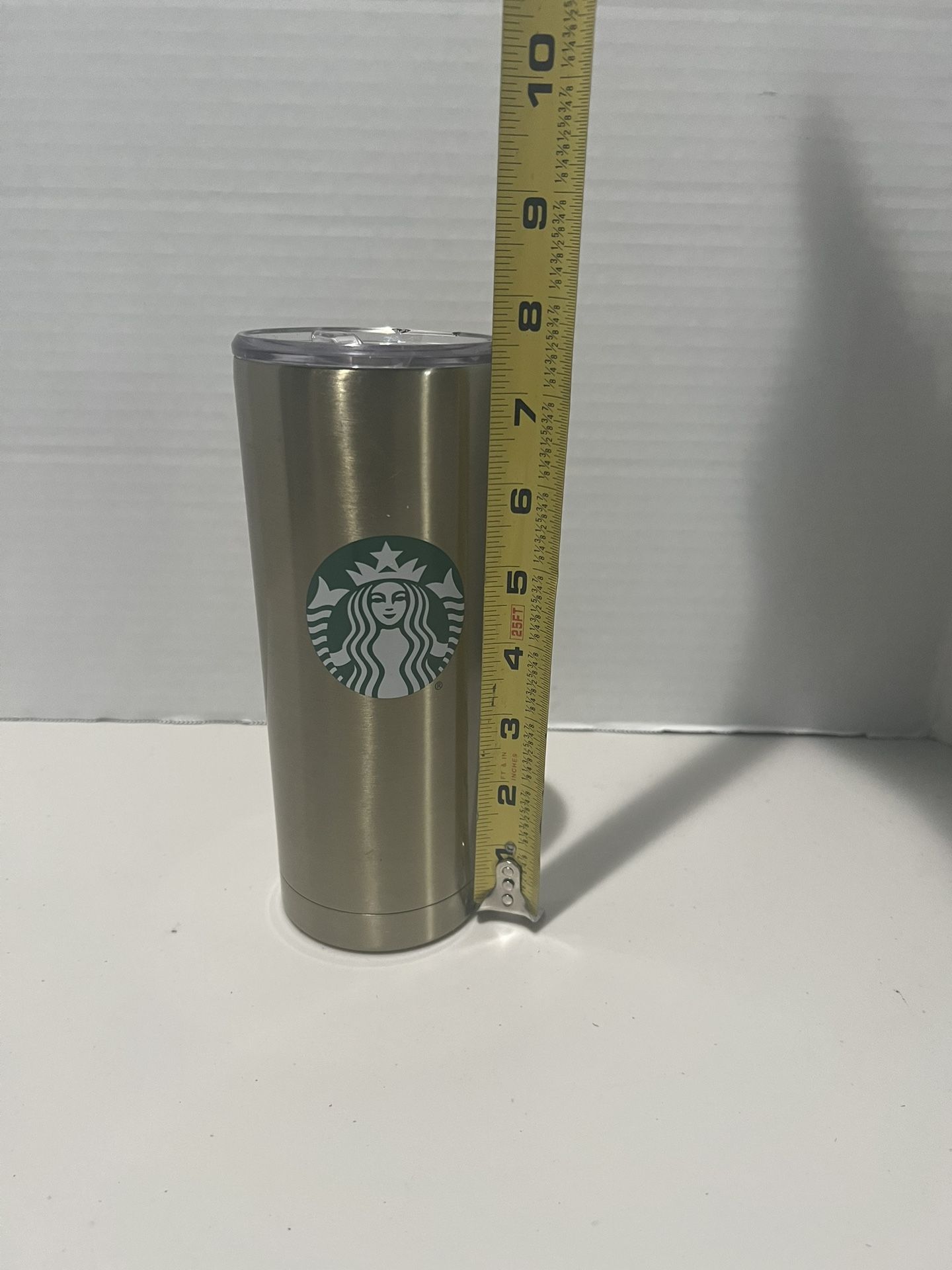 Starbucks gold Stainless Steel Travel Mug Tumbler - 20 Fl Oz 2021 used in good condition with minor cosmetic blemishes.