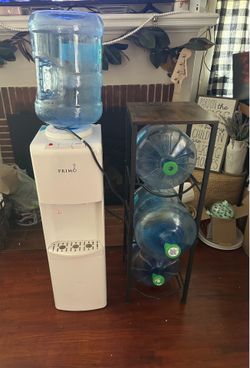 Water dispenser with stand and bottles