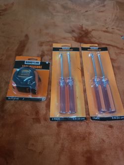 2  packs of  Screwdriver 🪛 sets  and 1 tape measure