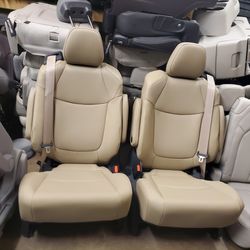 BRAND NEW TAN LEATHER BUCKET SEATS WITH SEATBELTS BUILD IN 