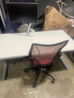 Conset 60x30 standing desk! I also have Herman miller Flo single and dual monitor arms available!