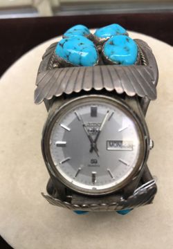 Men’s turquoise and silver Watch
