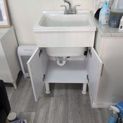 Utility sink with extra deep sink