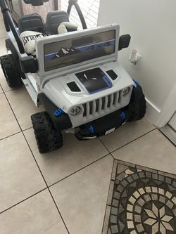 Power wheel jeep with battery.