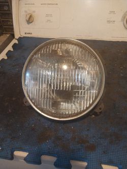 1966 and 1986 porsche and v w bitter left headlight , picked up in van nice