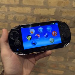Sony PS VITA OLED 1000 w/ Charger 