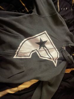 Famous stars and straps zip up size large