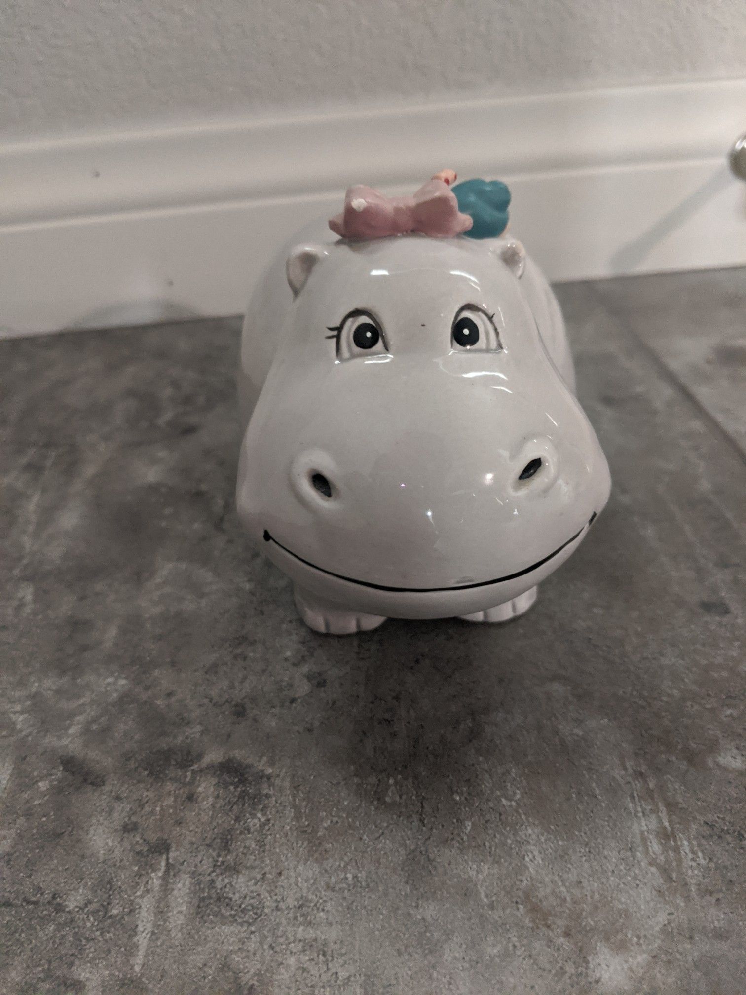 Vintage hippo and snail piggy bank