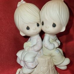 Precious Moments “Love One Another” Figurine by Jonathan & David (1976, Enesco E-1376)