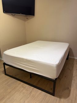 Almost New Full size mattress and bed frame