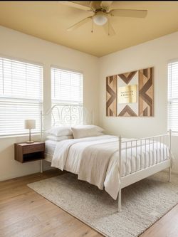 White frame bed with new mattress $40.00