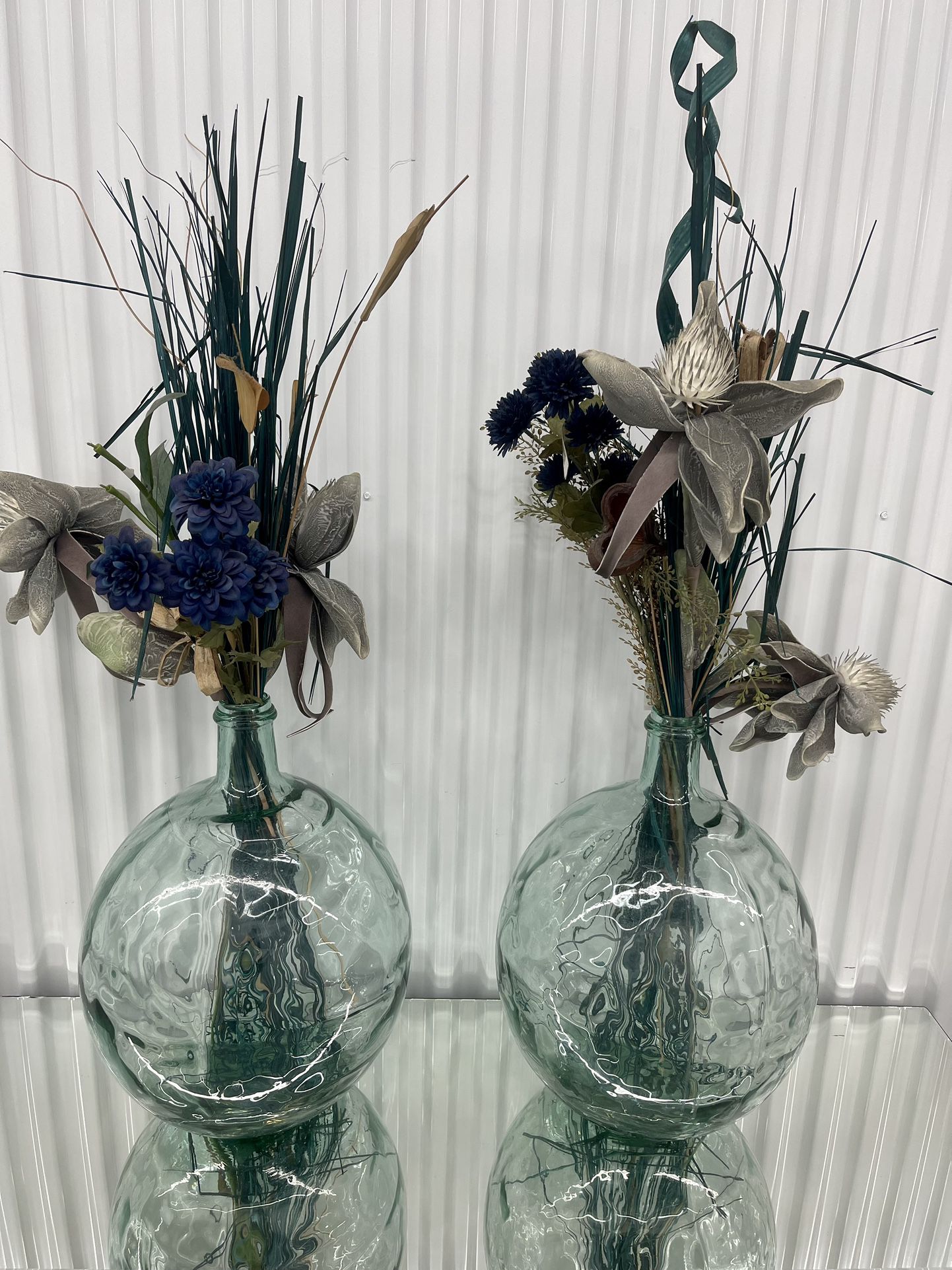 2 large glass vases & dry flowers.