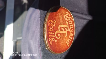 A,BELT BUCKLE THOUSAND TRAILS ONLY ONE AVAILABLE 