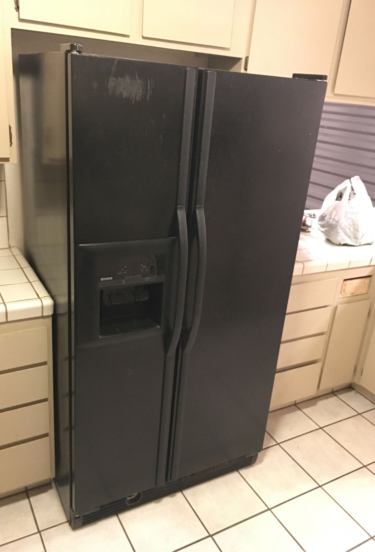 Black kenmore double door fridge