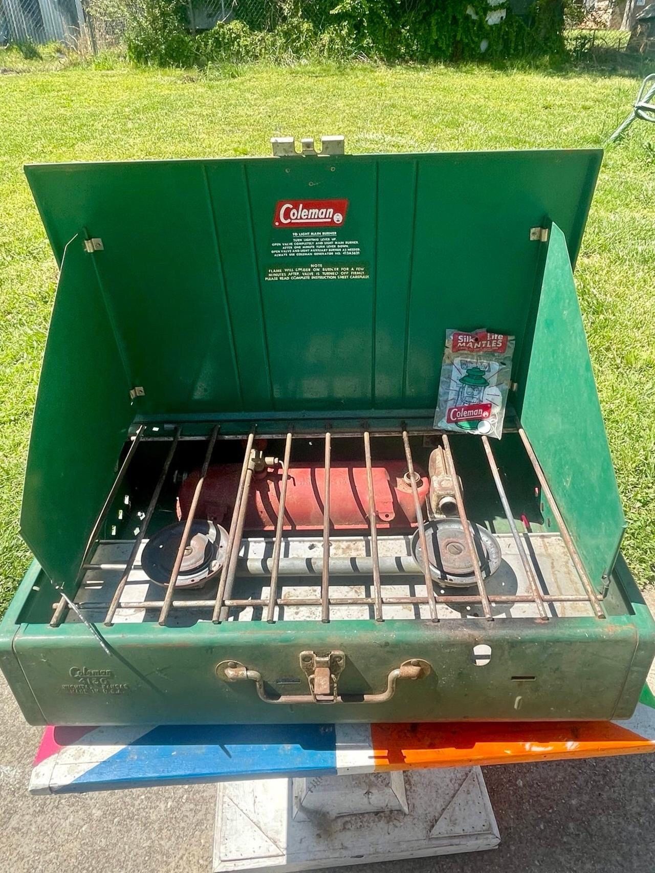CAMPING STOVE COLEMAN 2- BURNER, COMES WITH GALLON OF FUEL. USED GOOD CONDITION. WILL DEMO . ELMHURST, IL. 60126