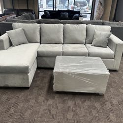 New Grey Sectional And Ottoman 