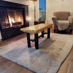 Farmhouse Rustic coffee table handcrafted from repurposed natural wood, showcasing authentic texture and timeless character.