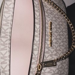 Rose gold Michael Kors purse