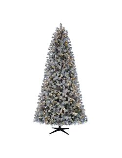 Christmas tree 9 ft. Pre-Lit LED Flocked Lexington Pine Artificial Christmas Tree with 500 Warm White Lights from Home Depot like new