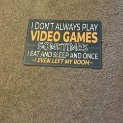 Metal video game sign